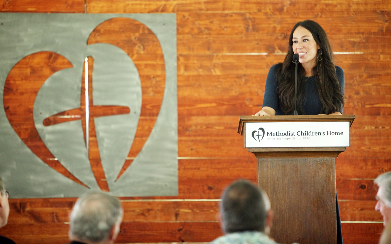 Speaker at podium during a Waco community event
